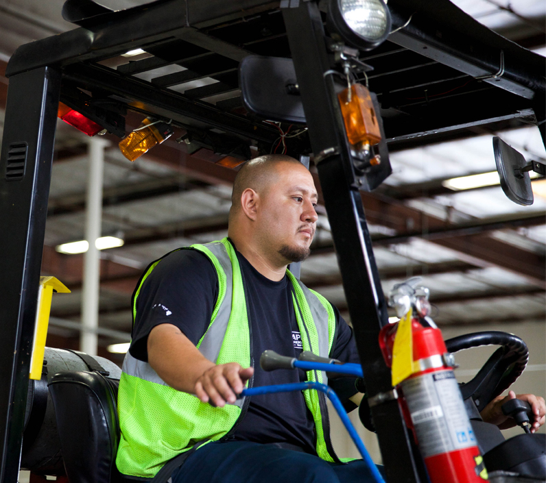 forklift-driver-looking-right-cs-right forklift driver loading