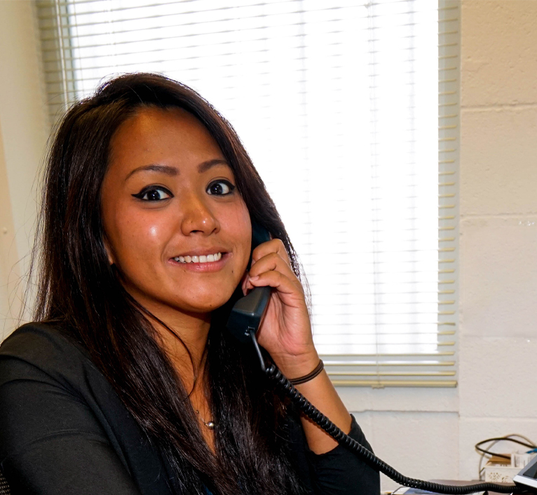 office-worker-woman-looking-ahead-is-right office worker hawaii on phone