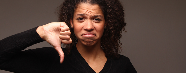 woman thumbs down