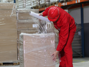 pallet being wrapped in shrink material