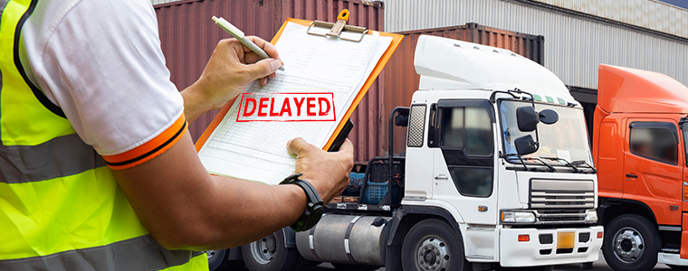 warehouse worker are holding clipboard with control loading a trucks.