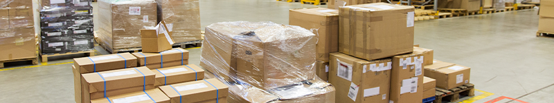 cargo boxes storing at warehouse shelves