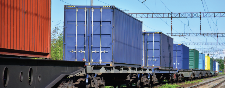 Cargo Containers Transportation On Freight Train By Railway. Intermodal Container On Train Car